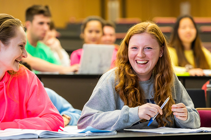 two international students laughing and enjoying UCD summer pgoramme